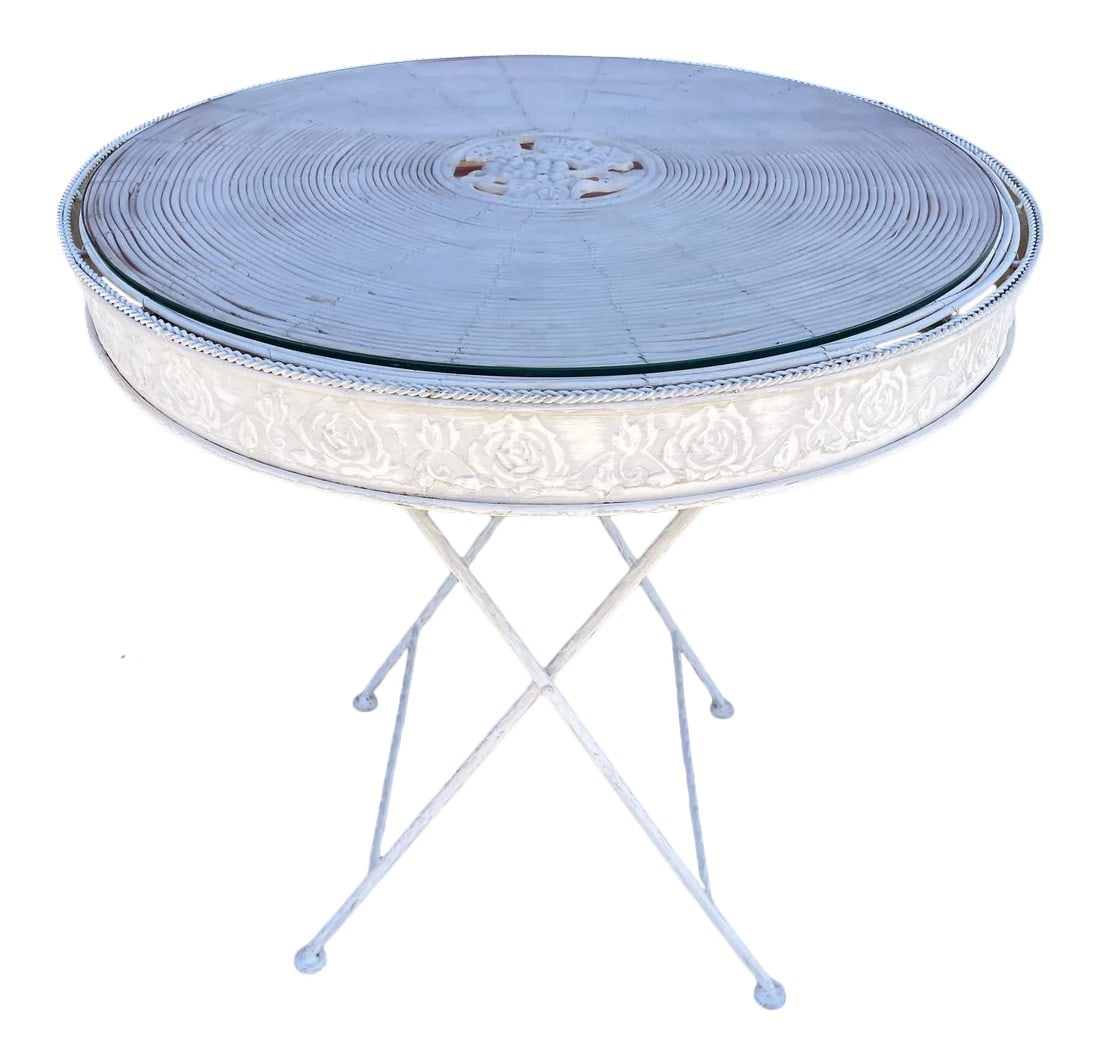 Vintage Wrought Iron Glass Top & Pencil Reed Garden Table: Vintage Wrought Iron Glass & Pencil Reed Top Garden Table. Beautiful rose print on the sides and in the middle of the table. Center is pencil reed and has a glass top. Structure is wrought iron and fo