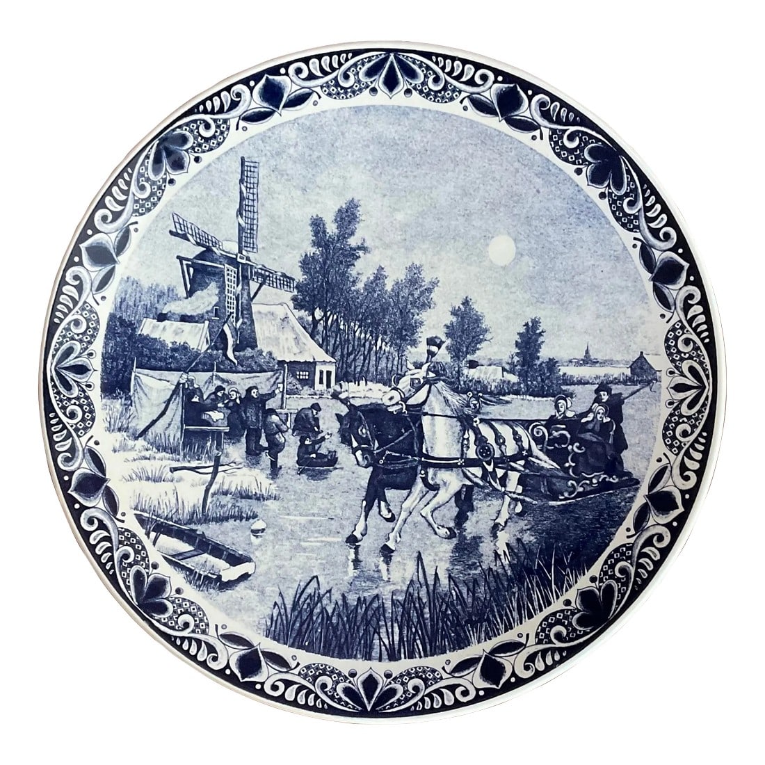 Vintage Original Delfts Blauw Platter Plate: Original hand-painted Delfts Blauw 15.5" platter. This charger sized plate is blue and white transferware and made in Holland. The scene depicts a windmill and people on a sleigh being pulled by a