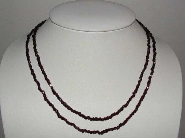 Victorian Rose Cut Bohemian Red Garnet Bead Necklace: Title:Victorian Rose Cut Bohemian Red Garnet Bead Necklace Description:Adorable and so delightful. Circa 1860's to 1880's. Necklace features two double strands of natural Bohemian rose cut red garnet