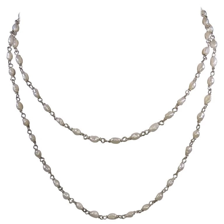 Alberto Juan Mexican Handmade Sterling Freshwater Pearl Flapper Necklace: Title:Alberto Juan Mexican Handmade Sterling Freshwater Pearl Flapper NecklaceDescription:This Alberto Juan one of a kind necklace was handmade from natural freshwater pearls collected from a local