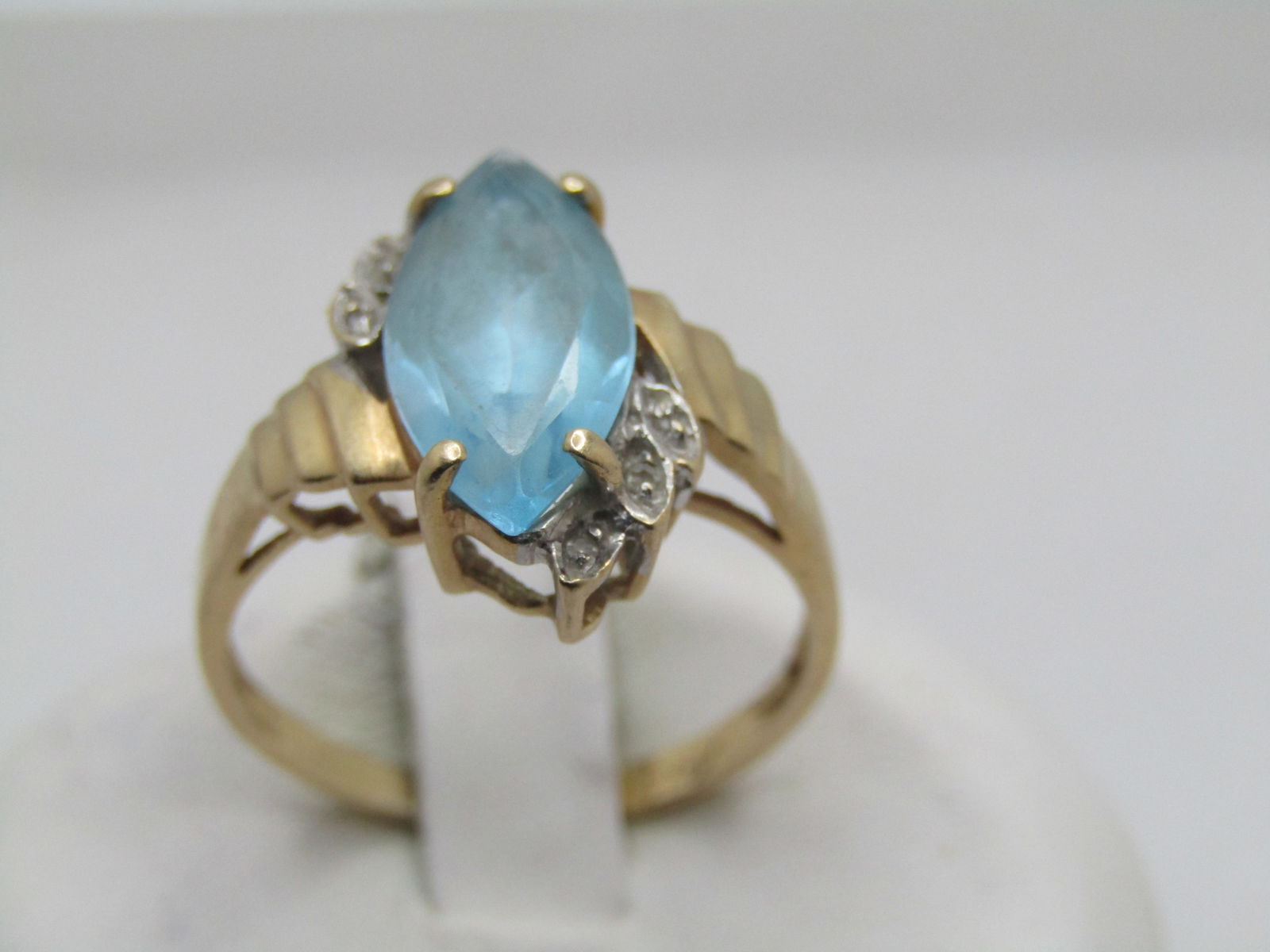 Vintage 14KT Blue Topaz Diamond Ring, Sz. 7, 1960's-1970's, Marquise: Title:Vintage 14KT Blue Topaz Diamond Ring, Sz. 7, 1960's-1970's, MarquiseDescription:Vintage 14KT Blue Topaz Diamond Ring, Sz. 7, 1960's-1970's, Marquise appx. 3 ctw stone yellow gold with six appx.