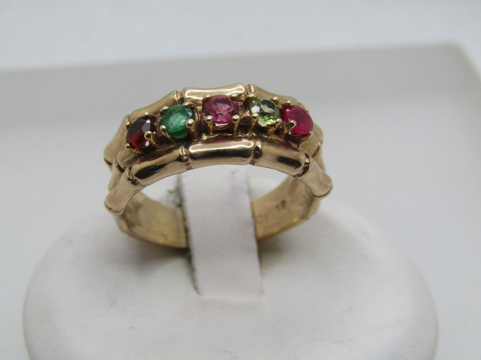 Vintage 10kt Mothers Ring, 5 Stones, Sz. 7, Signed GL, Bamboo Accents: Title:Vintage 10kt Mothers Ring, 5 Stones, Sz. 7, Signed GL, Bamboo AccentsDescription:Vintage 10kt Mothers Ring, 5 Stones, Sz. 7, Signed GL, Bamboo Accents. This has a round ruby; citrine;