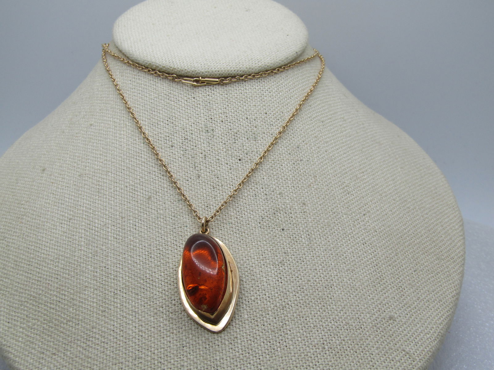 14kt Baltic Amber Necklace, 24" Signed MB.: Title:14kt Baltic Amber Necklace, 24" Signed MB. Description:14kt Baltic Amber Necklace, 24" Signed MB which is believed to be Marcin Buzalski (Poland). Age estimated 1990's. He works mostly with ster