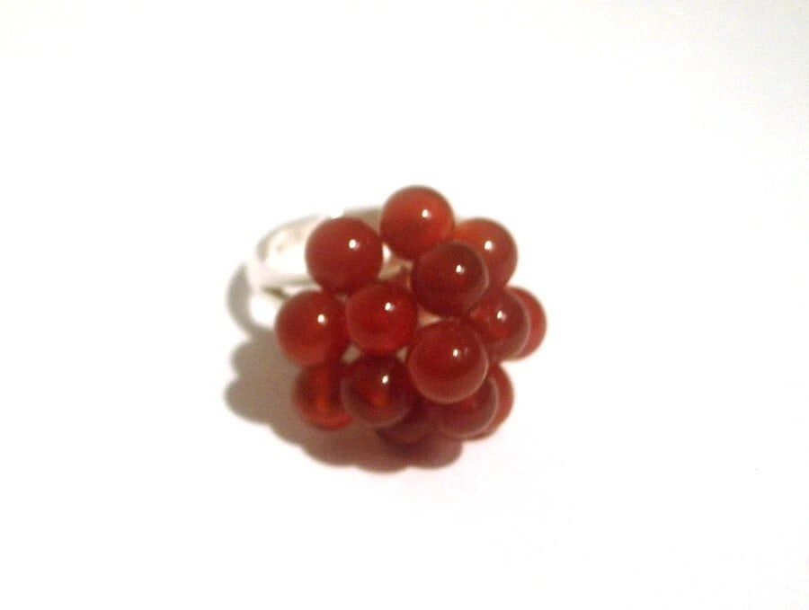 3 Tier Grape Cluster Cocktail Ring Sterling Silver with Carnelian Beads: Title:3 Tier Grape Cluster Cocktail Ring Sterling Silver with Carnelian BeadsDescription:This ring comes as an inspiration from my 4th jewelry collection of all cocktail rings, since they are popular
