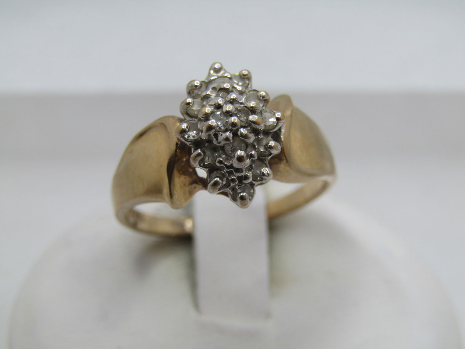 Vintage 10kt Diamond Cluster Waterfall Ring, Sz. 6, 1980's, Signed: Title:Vintage 10kt Diamond Cluster Waterfall Ring, Sz. 6, 1980's, SignedDescription:Vintage 10kt Diamond Cluster Waterfall Ring, Sz. 6, 1980's, Signed FAS and marked 10kt and tests as 10kt with a