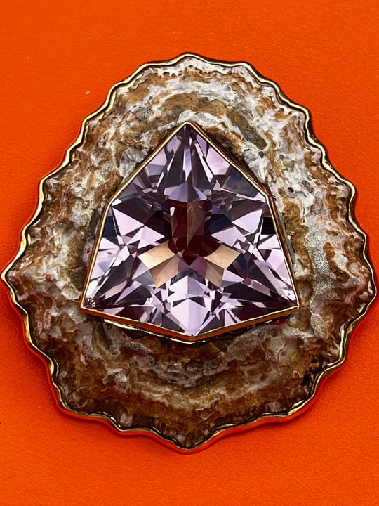 Traffic-Stopping African Limpet Brooch set with Giant Amethyst: Title:Traffic-Stopping African Limpet Brooch set with Giant Amethyst Description:The rock in this shell is the size of an avocado! The brooch is made from an unusual and very large African Limpet set