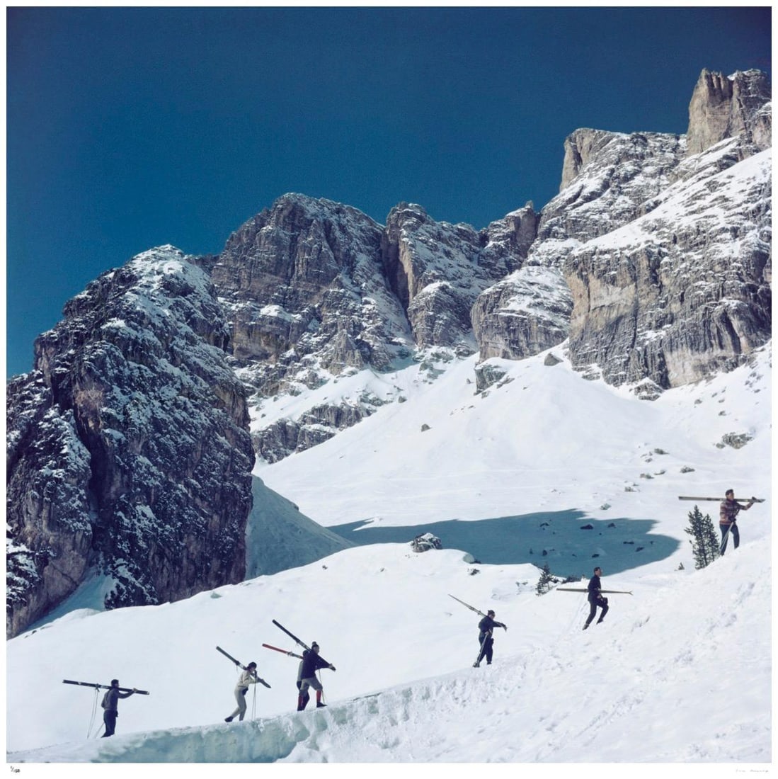 Cortina D’Ampezzo 1962 - Slim Aarons Estate Stamped: 1962 (printed later): Title: Cortina D’Ampezzo 1962 - Slim Aarons Estate Stamped: 1962 (printed later) Description: Cortina D’Ampezzo 1962 - Slim Aarons Estate Stamped Skiers walk up a mountain in Cortina DR