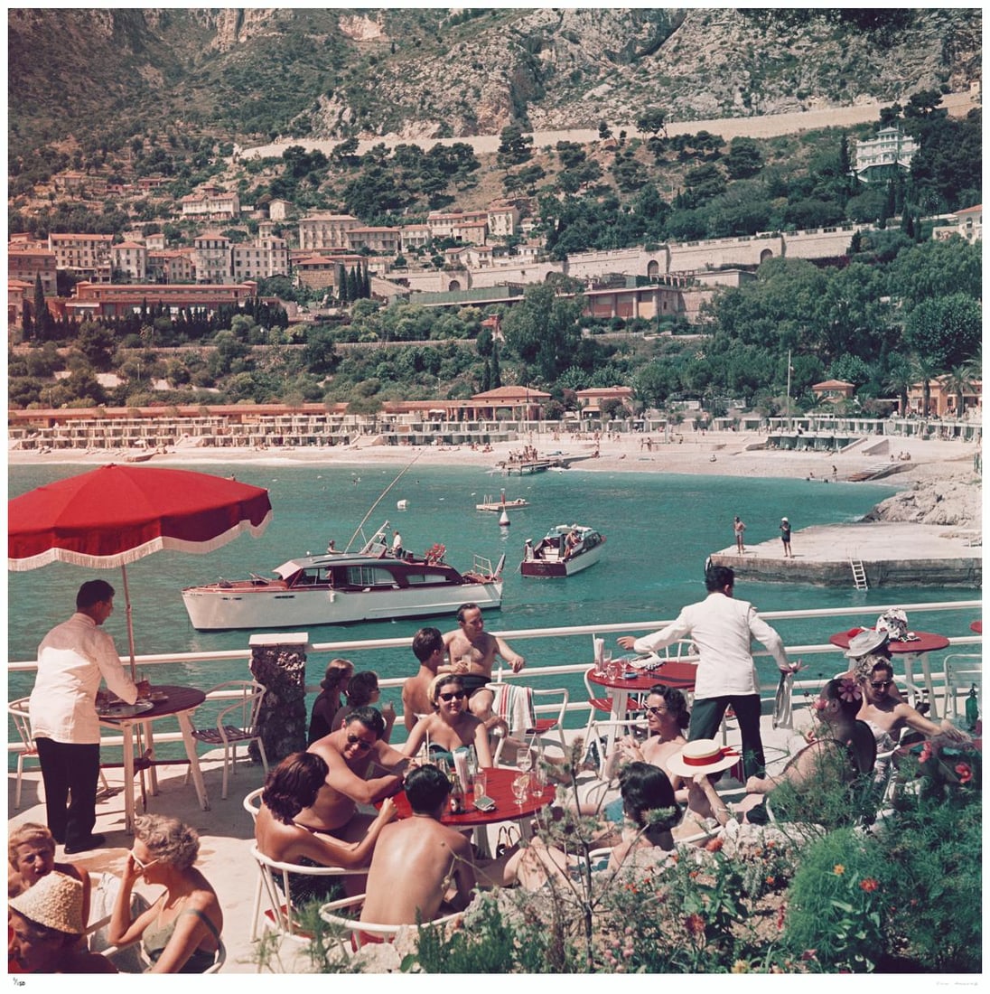 Cafe Terrace In Nice 1957 - Slim Aarons Estate Stamped: 1957 (printed later): Title: Cafe Terrace In Nice 1957 - Slim Aarons Estate Stamped: 1957 (printed later) Description: Cafe Terrace In Nice 1957 - Slim Aarons Estate Stamped Holidaymakers on a cafe terrace in Nice on the F