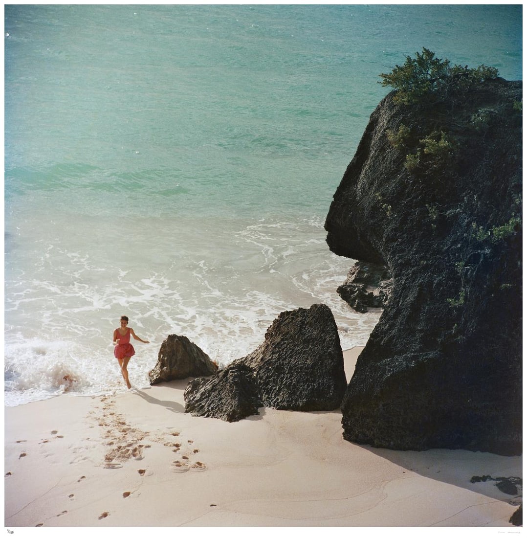 Bermuda Beach 1957 - Slim Aarons Estate Stamped: 1957 (printed later): Title: Bermuda Beach 1957 - Slim Aarons Estate Stamped: 1957 (printed later) Description: Bermuda Beach 1957 - Slim Aarons Estate Stamped A woman on a beach in Bermuda, 1957. (Photo by Slim Aarons)