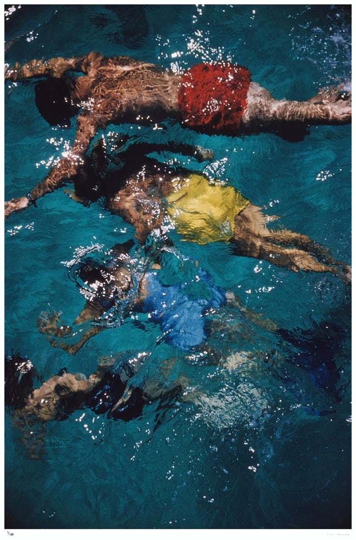 Swimming In The Bahamas 1959 - Slim Aarons Estate Stamped: 1959 (printed later): Title: Swimming In The Bahamas 1959 - Slim Aarons Estate Stamped: 1959 (printed later) Description: Swimming In The Bahamas 1959 - Slim Aarons Estate Stamped Brightly coloured swimmers in a pool in