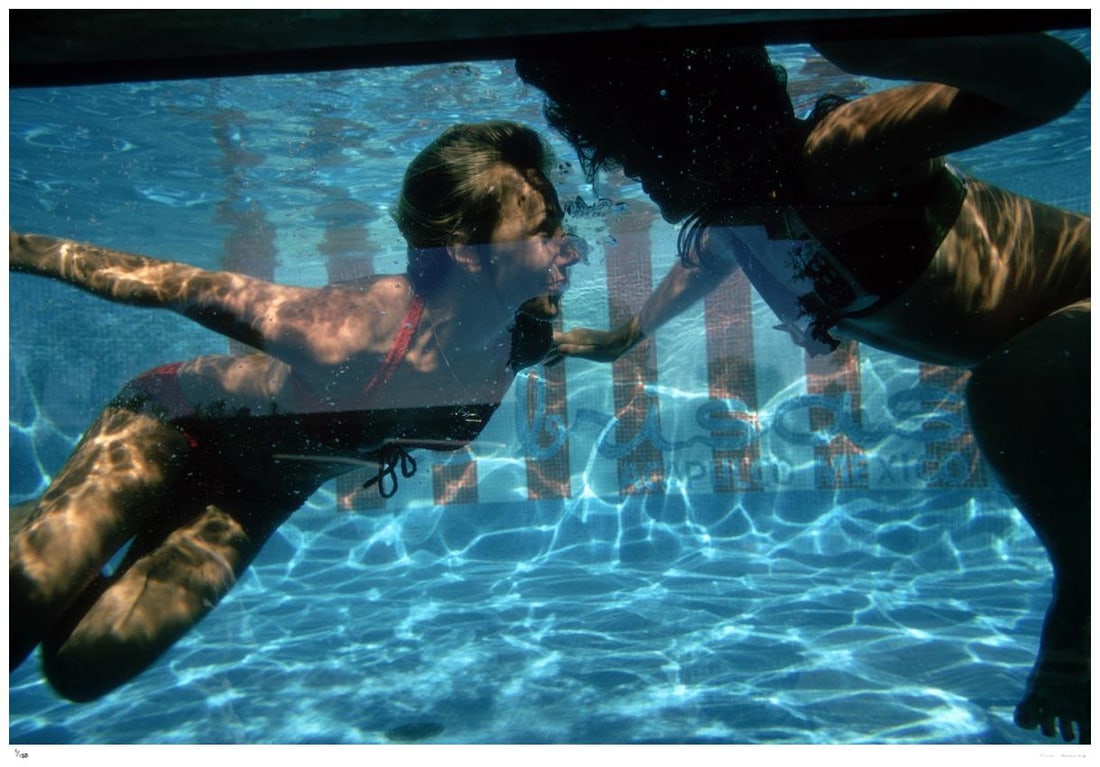 Swimmers At Las Brisas 1972- Slim Aarons Estate Stamped: 1972 (printed later): Title: Swimmers At Las Brisas 1972- Slim Aarons Estate Stamped: 1972 (printed later) Description: Swimmers At Las Brisas 1972- Slim Aarons Estate Stamped Guests in the pool at the Las Brisas Hotel,