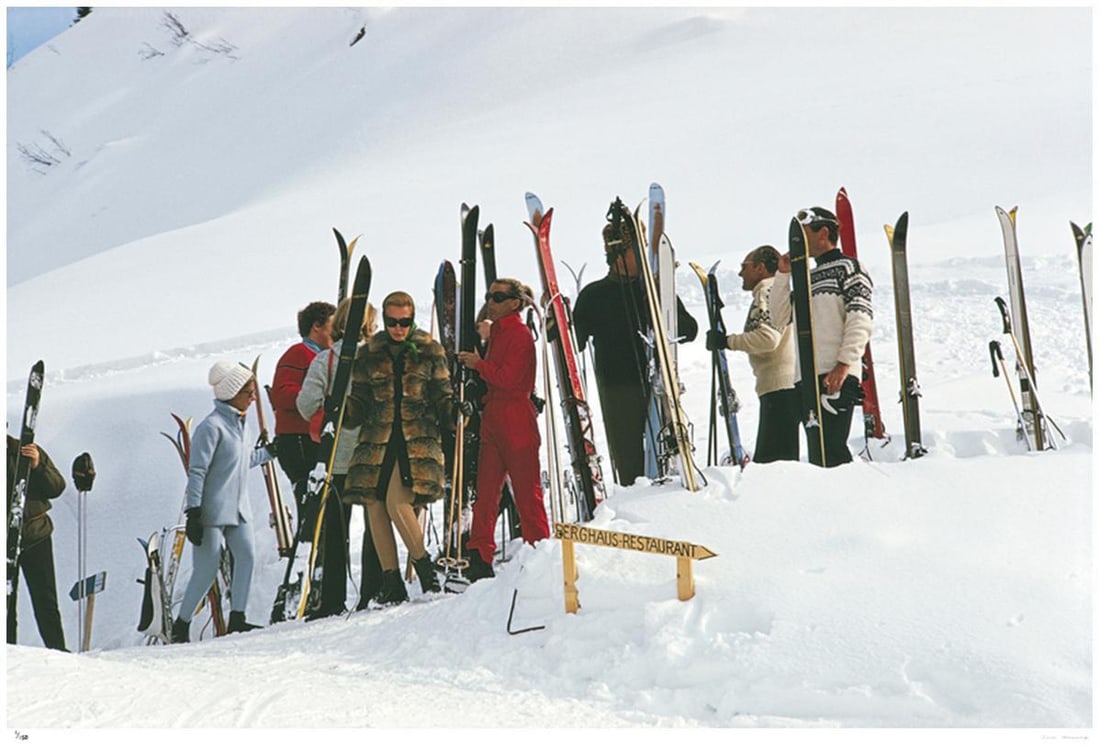 Skiers at Gstaad 1969 - Slim Aarons Estate Stamped: 1969 (printed later): Title: Skiers at Gstaad 1969 - Slim Aarons Estate Stamped: 1969 (printed later) Description: Skiers at Gstaad 1969 - Slim Aarons Estate Stamped Skiers on the slopes at the Sugarbush Resort, Vermont, U
