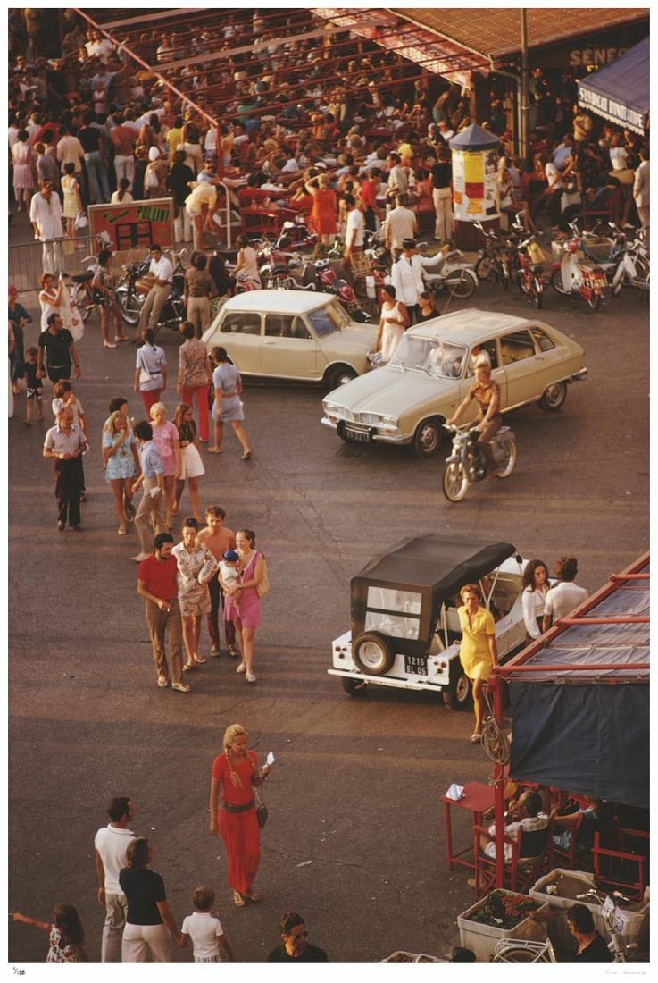 Saint-Tropez 1970 - Slim Aarons Estate Stamped: 1970 (printed later): Title: Saint-Tropez 1970 - Slim Aarons Estate Stamped: 1970 (printed later) Description: Saint-Tropez 1970 - Slim Aarons Estate Stamped Cars and pedestrians on the busy seafront at Saint-Tropez, in so
