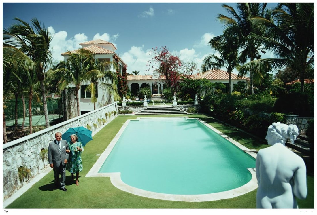 Lyford Cay 1974 - Slim Aarons Estate Stamped: 1974 (printed later): Title: Lyford Cay 1974 - Slim Aarons Estate Stamped: 1974 (printed later) Description: Lyford Cay 1974 - Slim Aarons Estate Stamped Lord and Lady Martonmere in the garden of the Villa El Mirador, thei
