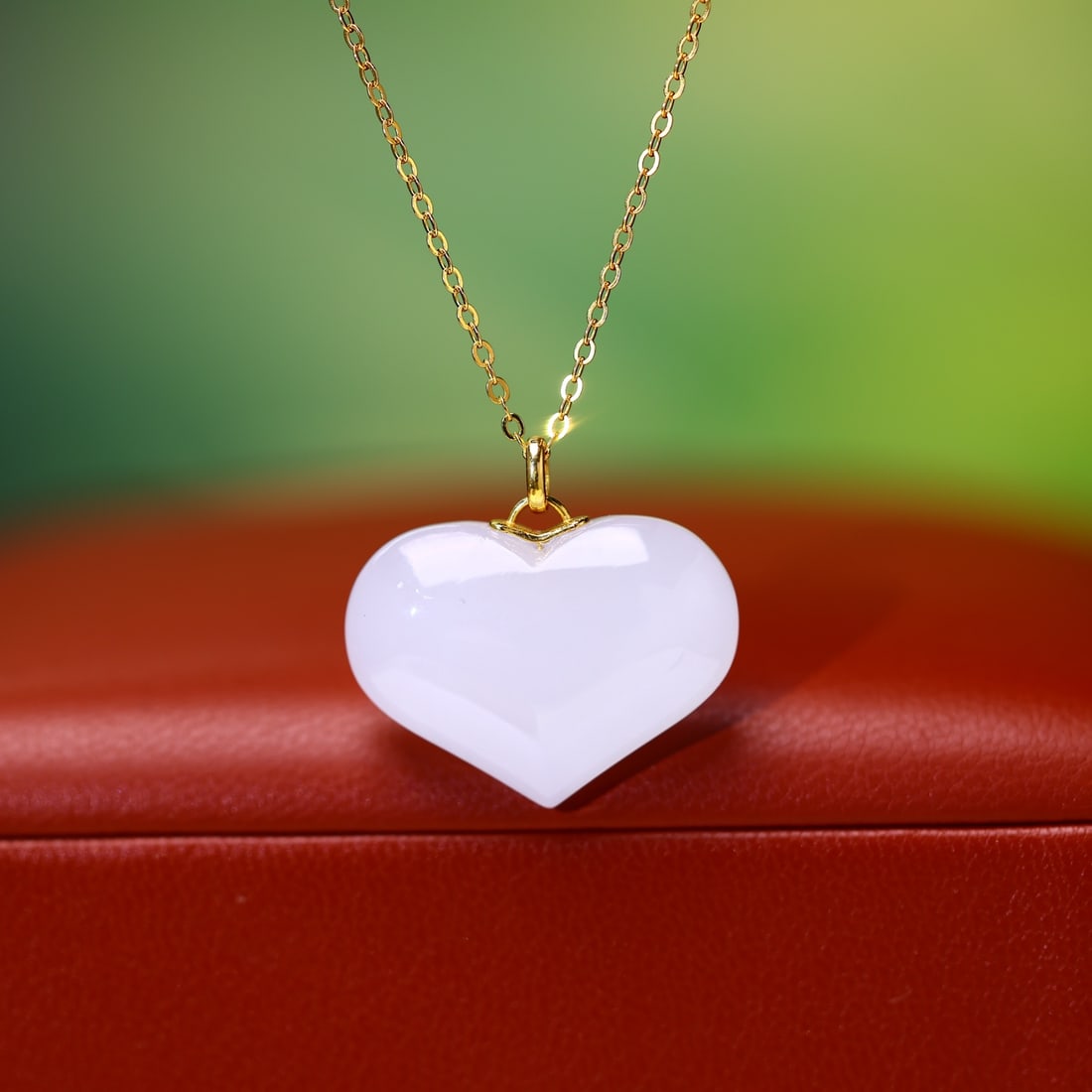 18K Inlaid Heart Pendant with White Jade from Hetian: 18K Inlaid White Jade Heart Pendant, 17x23mm Reserve: $300.00 Shipping: Domestic: Shipping rates are determined by destination International: Foreign shipping rates are determined by destination. Inte