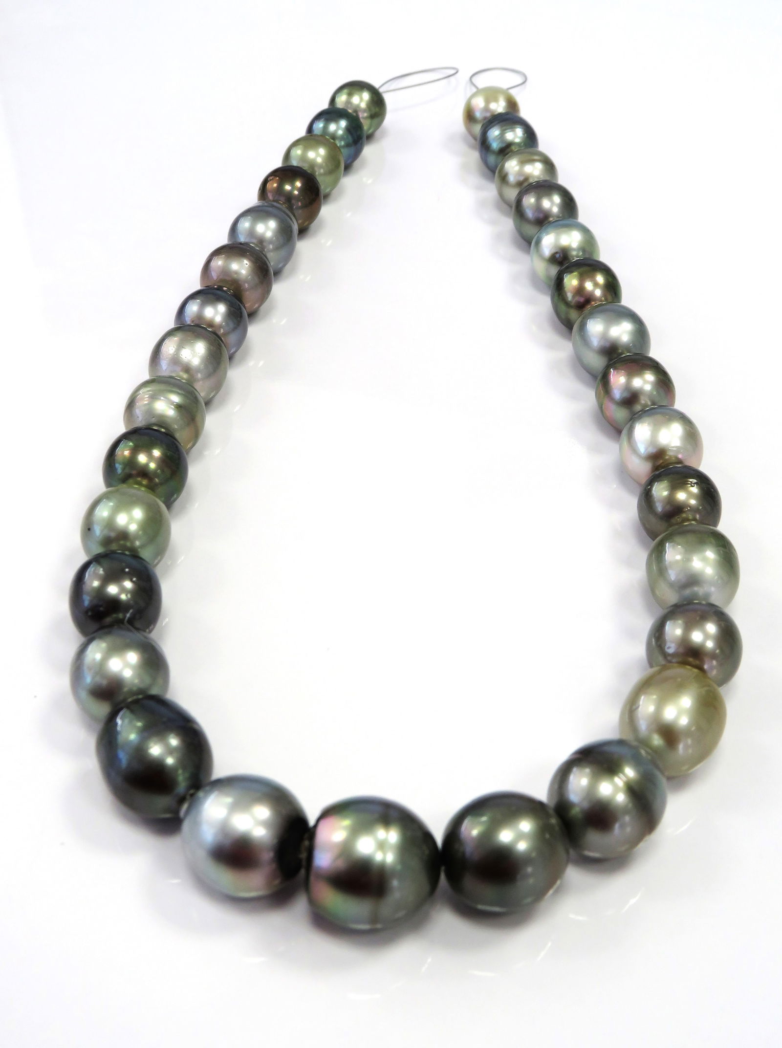 12-15mm Oval/Drop-Circle Light to Medium Multi Tahitian Pearl Necklace Strand: Title:12-15mm Oval/Drop-Circle Light to Medium Multi Tahitian Pearl Necklace Strand Description:AA-Grade High luster Light to Medium Multi-Color Oval/Drop, with minimal spots/blemishes, 31 pearl piece