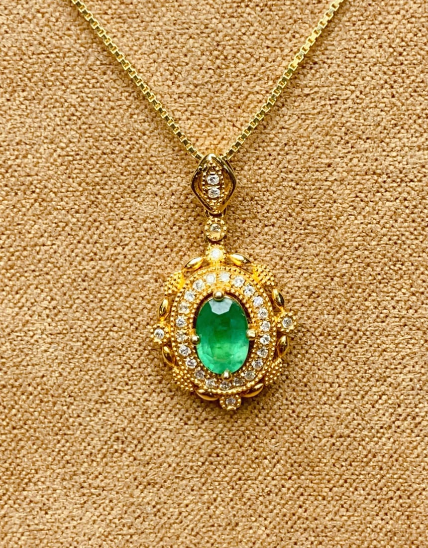 Natural Emerald Pendant: Natural emerald pendant, main stone: approximately 0.45ct, total weight: 1.23g, diamonds: 17p Reserve: $900.00 Shipping:Domestic: Shipping rates are determined by destinationInternational: Foreign