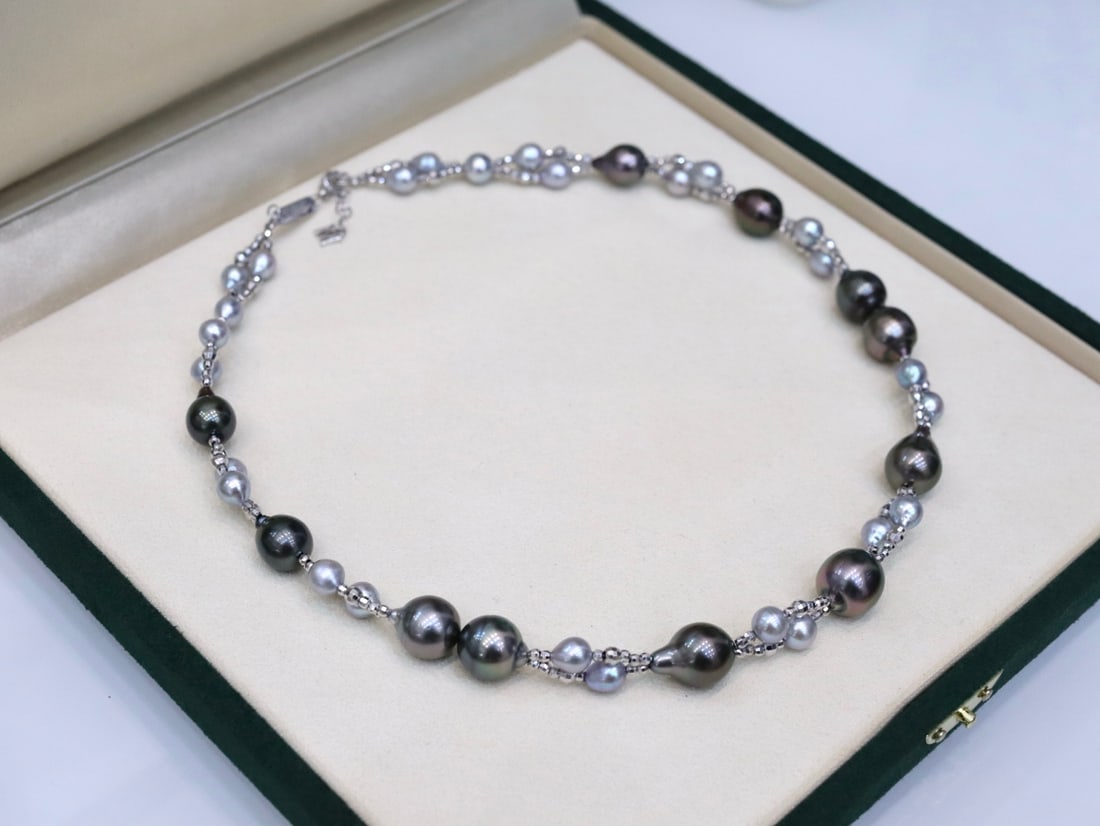 Tahitian Akoya Pearl Braided Necklace: 10-11mm Tahitian black pearl with glossy luster, spaced 5-6mm with real Akoya pearls in Ama-gai color, woven with S925 silver gold beads, adjustable length chain. Reserve: $900.00 