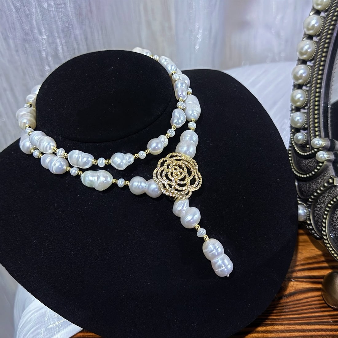 Baroque Pearl Sweater Chain: Baroque pearl sweater chain, uniquely shaped gourd-shaped natural pearls paired with camellia all-purpose buckle - Versatile wear, approximately 60cm in length Reserve: $150.00 Shipping:Domestic:
