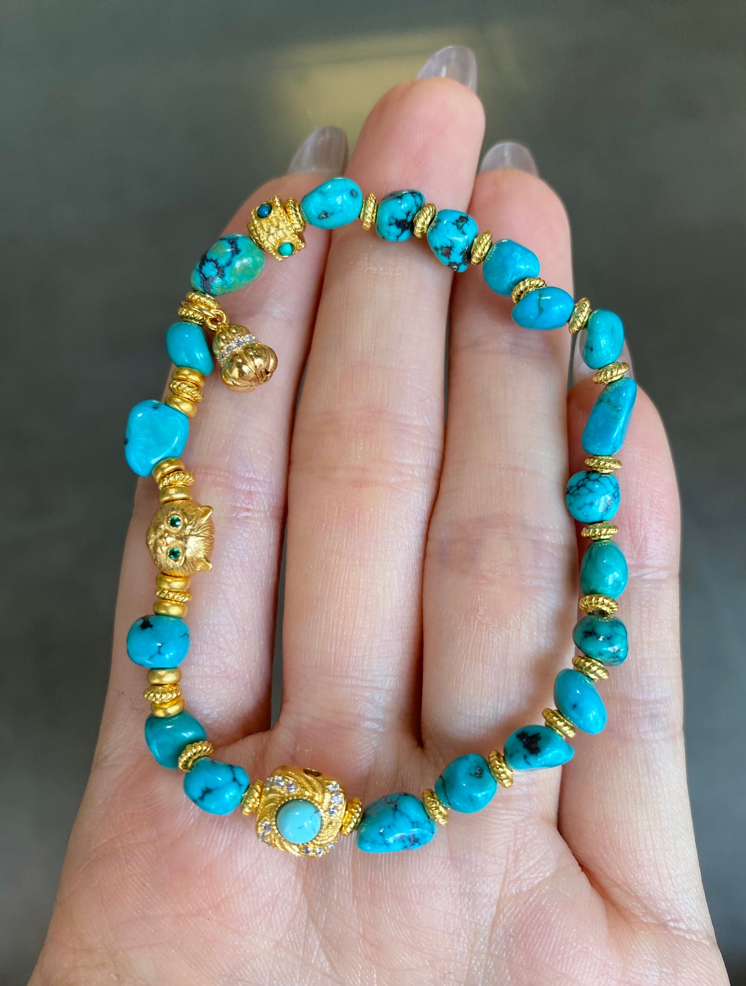 Turquoise Kitten Bracelet: Turquoise Kitten Bracelet Reserve: $400.00 Shipping:Domestic: Shipping rates are determined by destinationInternational: Foreign shipping rates are determined by destination. International shipping