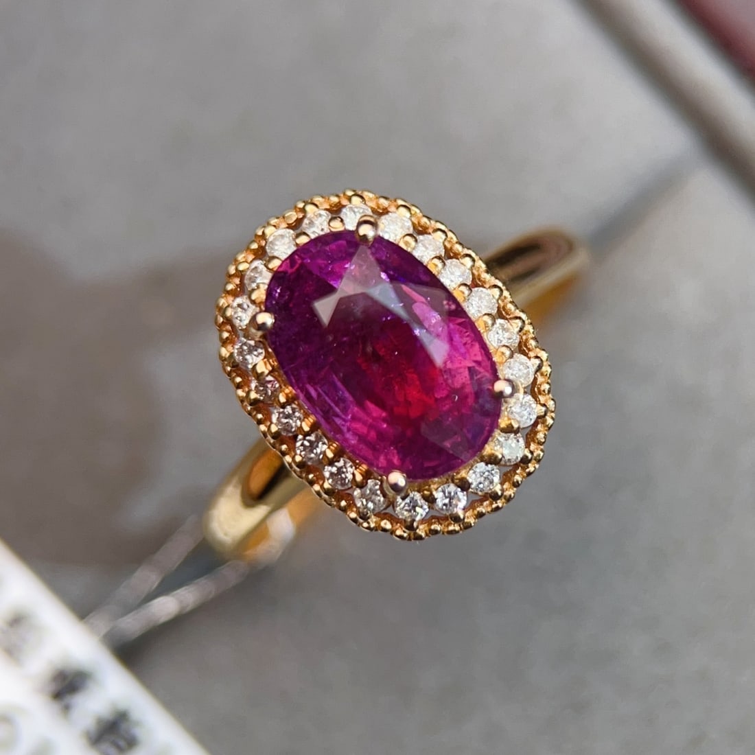 18K Gold Ring with Tourmaline: 18K gold ring set with tourmaline, total weight 2.61g, main stone 2.6ct, 22 diamonds Reserve: $1,500.00 Shipping:Domestic: Shipping rates are determined by destinationInternational: Foreign