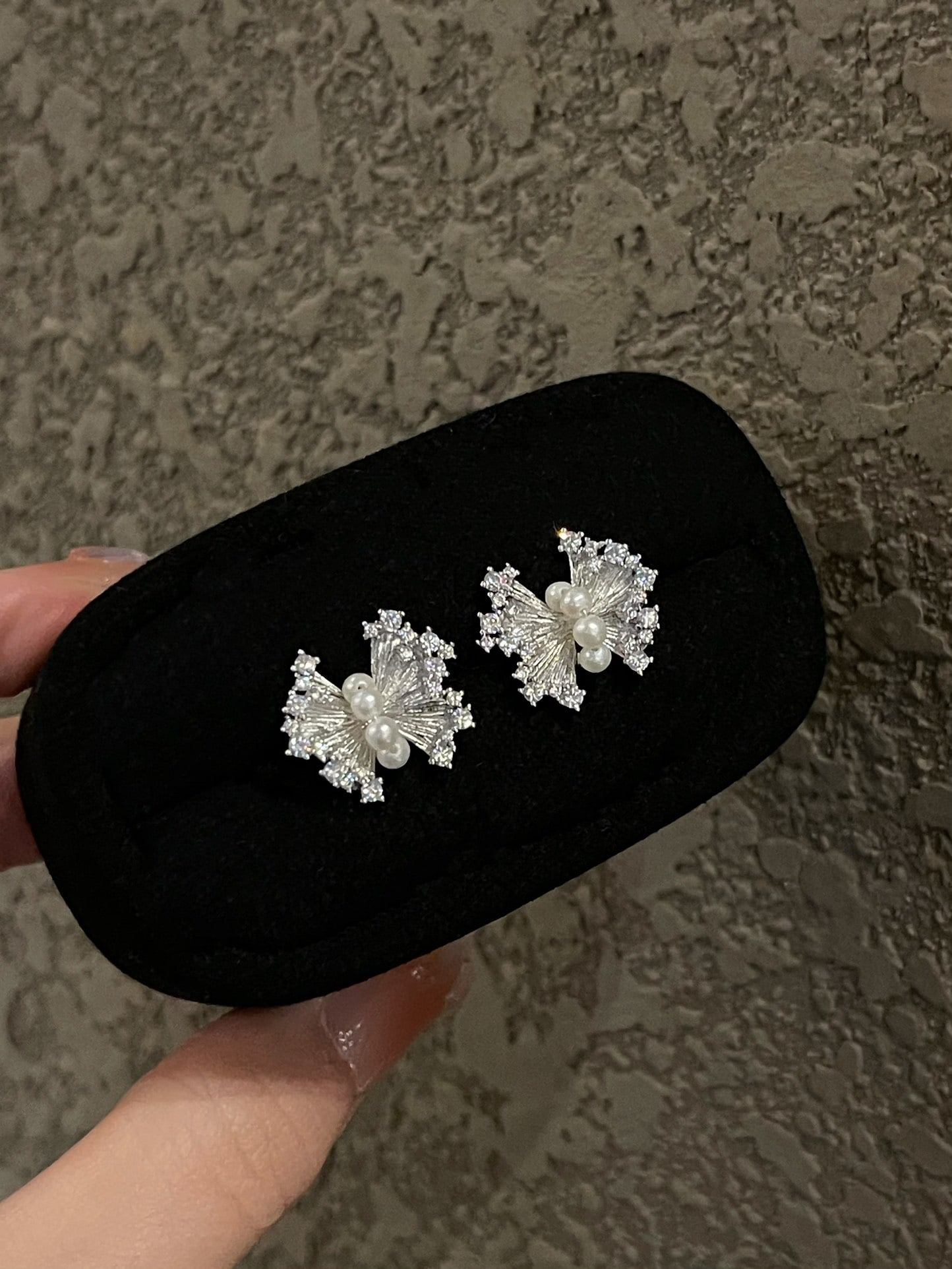 Bow Pearl Earrings: Bowknot pearl stud earrings, perfect combination of pearls and zirconia, elegant and cute bowknot design, 2-3mm natural freshwater pearls Reserve: $100.00 Shipping:Domestic: Shipping rates are