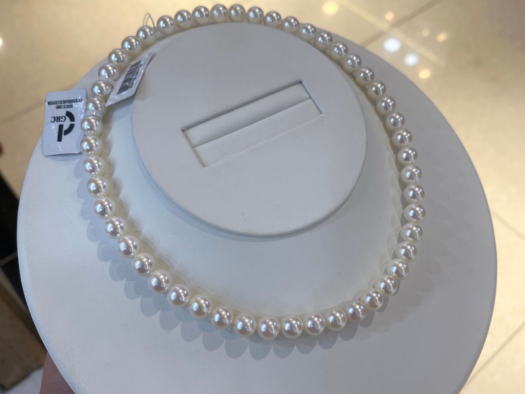 Akoya Pearl Flower Bead Necklace: white pearl flower bead necklace, perfectly round with very minor flaws, 8-8.5mm Reserve: $2,000.00 Shipping:Domestic: Shipping rates are determined by destinationInternational: Foreign shipping