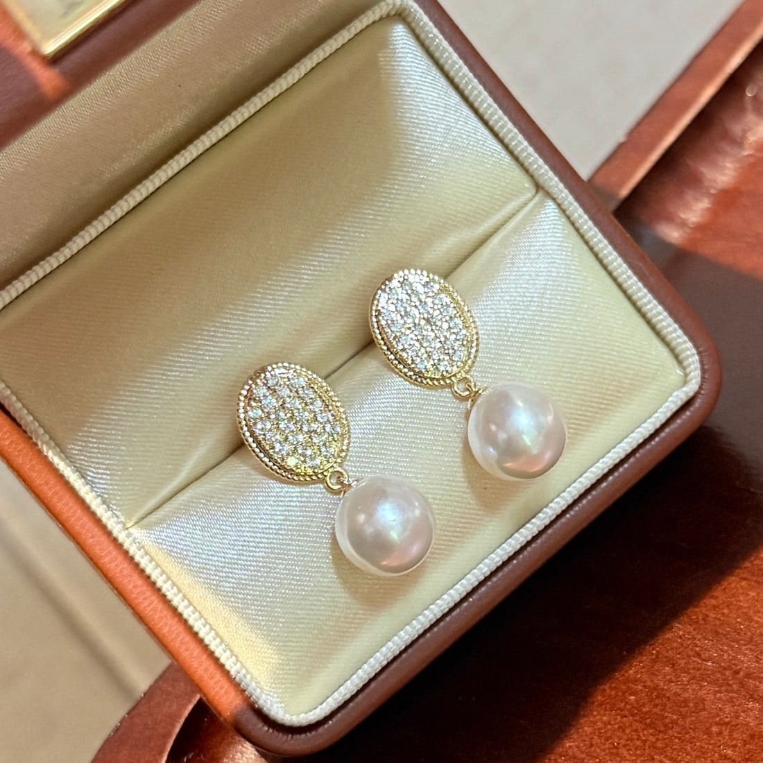 Oval Pearl Button Earrings: Oval button stud earrings, 10-11mm bright baroque freshwater pearls, 14k gold plated fine micro-set, simple and versatile elegant style Reserve: $150.00 Shipping:Domestic: Shipping rates are