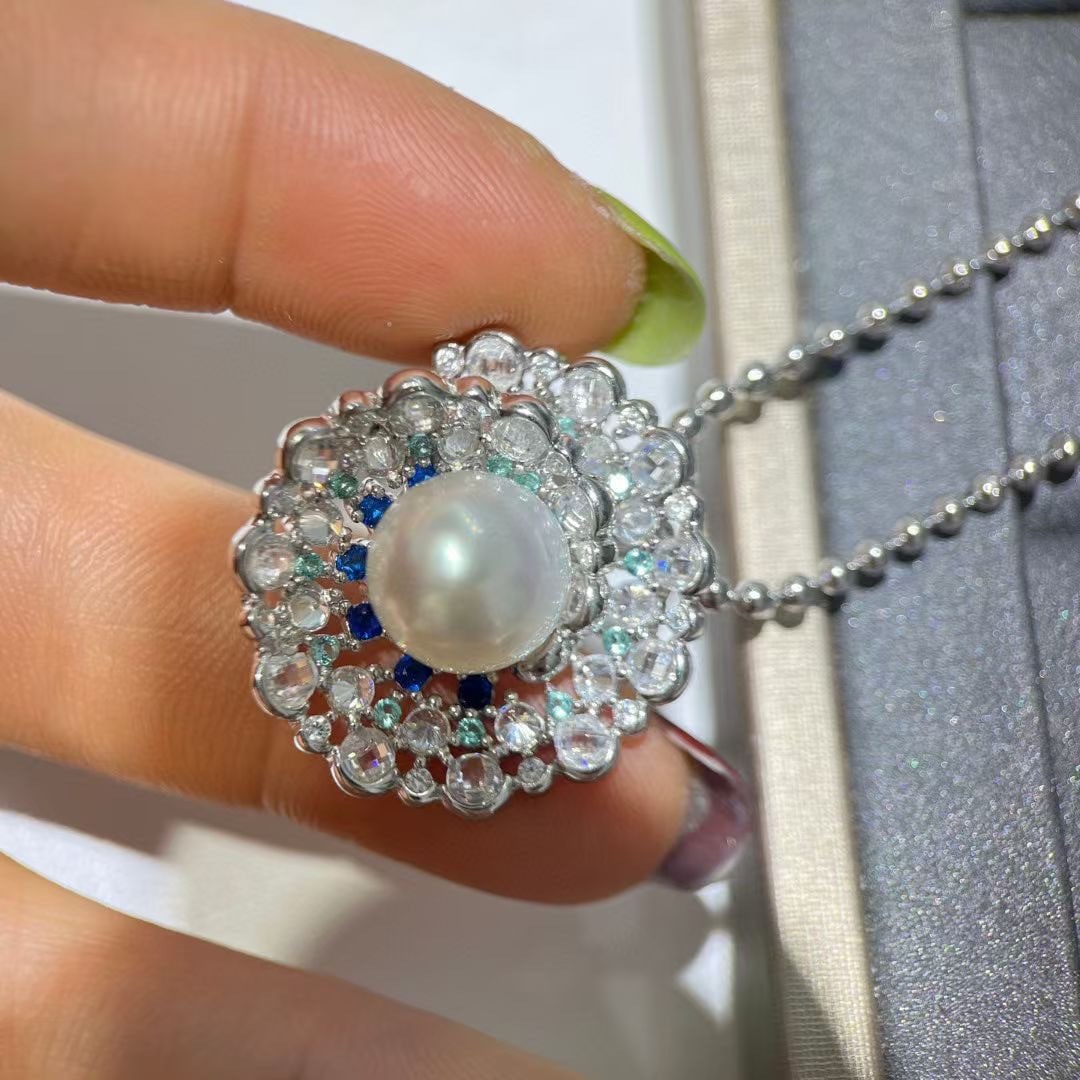 Sterling Silver Pearl Pendant: Exquisite pure silver pendant, exclusive custom-designed zirconia, 10-11mm perfect round surface without flaws, lustrous and smooth Reserve: $200.00 Shipping:Domestic: Shipping rates are determined