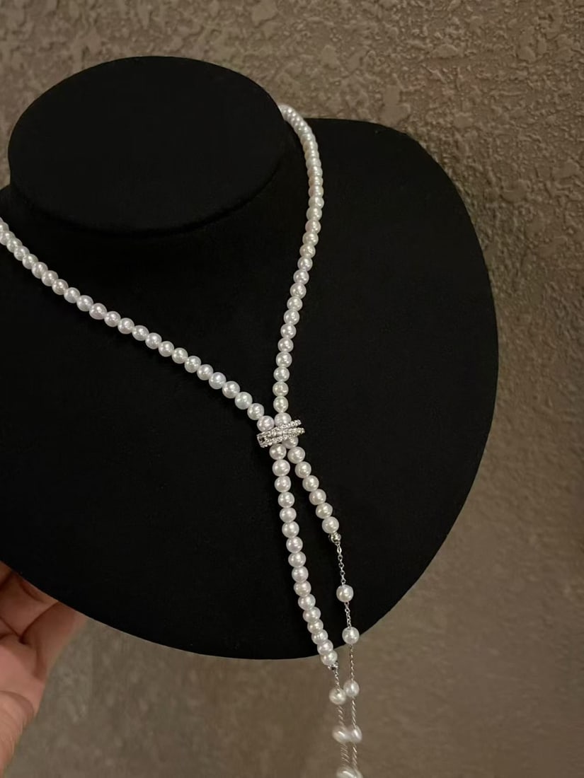 Pearl Waterfall Sweater Chain Necklace: Pearl Waterfall Sweater Chain Necklace, approximately 4mm natural freshwater pearls, total length about 85cm Reserve: $200.00 Shipping:Domestic: Shipping rates are determined by