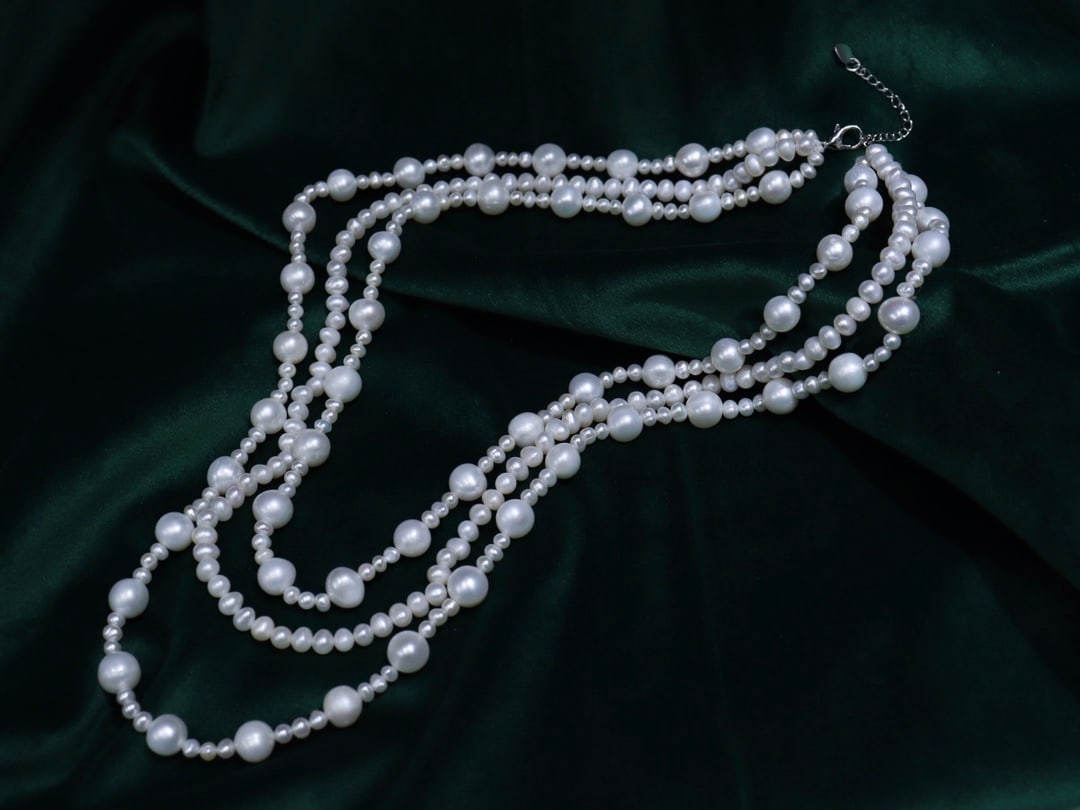 Natural Freshwater Pearl Necklace: Natural freshwater pearl necklace, about 4-9mm, slightly flawed, handcrafted Reserve: $300.00 Shipping:Domestic: Shipping rates are determined by destinationInternational: Foreign shipping rates