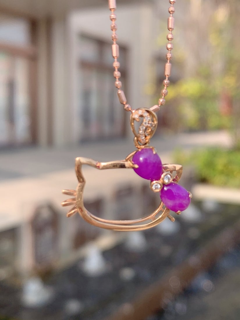 18K Gold, Diamond Encrusted Sugilite Pendant: 18K Gold, Amethyst Inlayed Amethyst Pendant, Rough Stone 2.00ct, 13 Diamonds Reserve: $1,200.00 Shipping:Domestic: Shipping rates are determined by destinationInternational: Foreign shipping rates