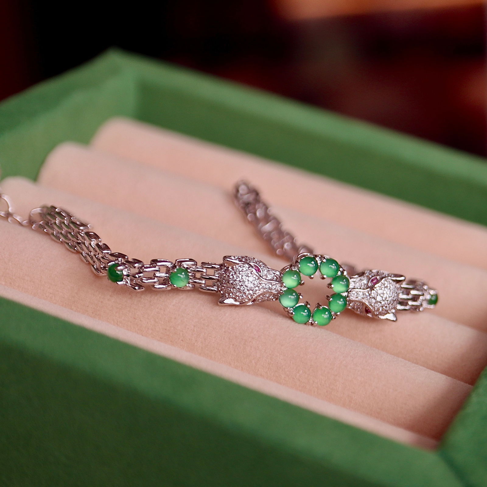 Natural Jade Leopard Bracelet: Natural Jadeite Leopard Bracelet with 12 High-Icy Yang Green Beads, Luxuriously Inlaid, Plated with 18K White Gold Reserve: $100.00 Shipping:Domestic: Shipping rates are determined by
