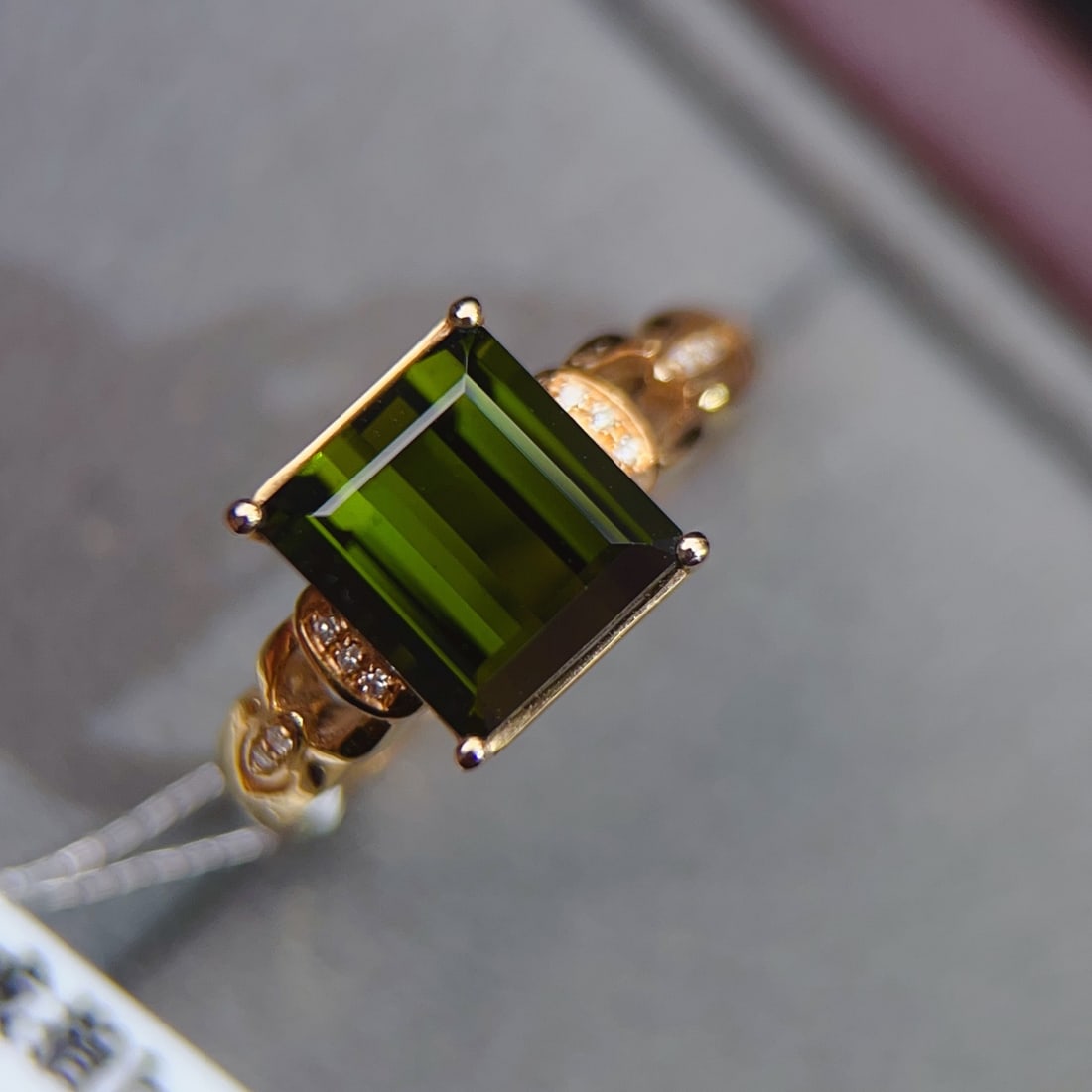 18k Gold Ring with Diamond and Tourmaline Inlay: 18K gold ring set with tourmaline and diamonds, total weight: 2.86g. Main stone: 2.75ct. Diamonds: 0.03ct/10pcs Reserve: $1,200.00 Shipping: Domestic: Shipping rates are determined by destination Inte