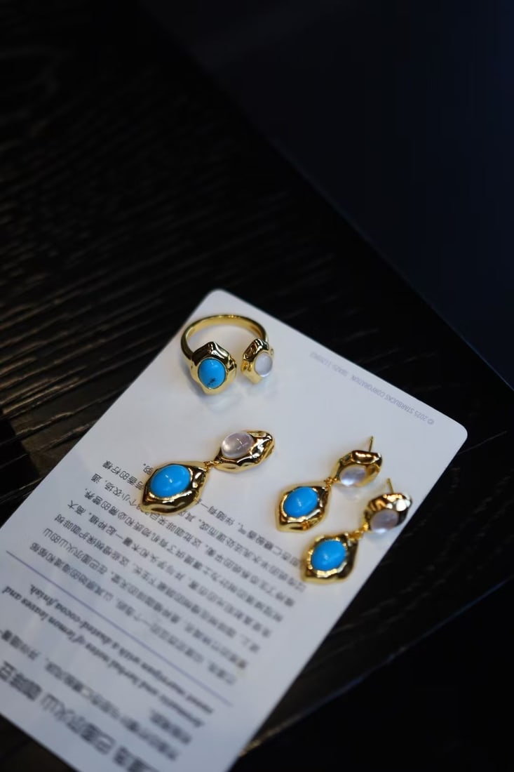 S925 Silver Turquoise Set: S925 silver turquoise set. Paired with white crystal. The main stone's color is also beautiful. Includes earrings, a ring, and a pendant. Reserve: $450.00 Shipping:Domestic: Shipping rates are