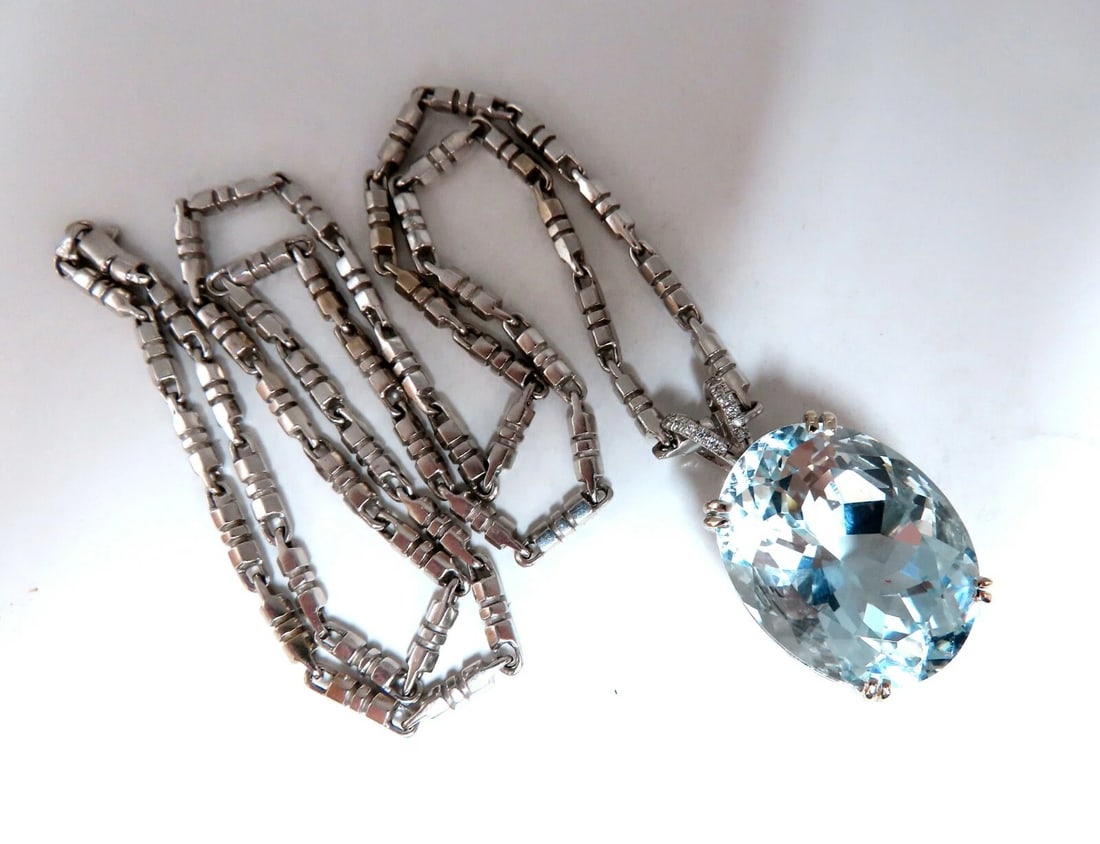 GIA Certified Natural 42.02ct Blue Aquamarine Diamonds Necklace 14Kt **: Title: GIA Certified Natural 42.02ct Blue Aquamarine Diamonds Necklace 14Kt ** Description: MAGNIFICENT JEWELS GIA Certified 42.02ct. Natural Aquamarine Necklace #2201404089 Oval Cut, Clean