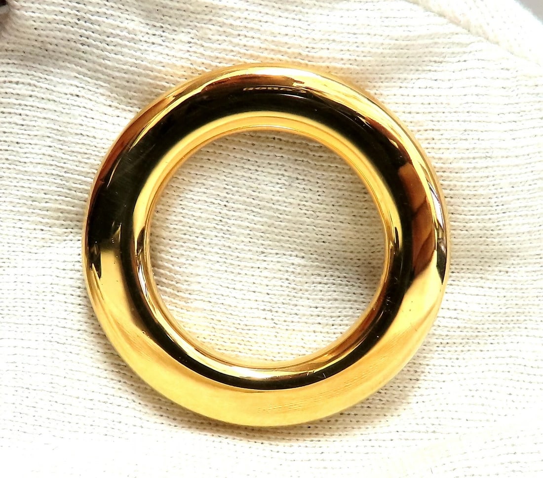 High Shine Circular Gold Pin 14 Karat**: Title: High Shine Circular Gold Pin 14 Karat** Description: MAGNIFICENT JEWELS Circular Gold pin. 1.6 inch Diameter 1.04 inch inner opening .32 inch frame 14kt. yellow gold 8.9 grams Free Insured over
