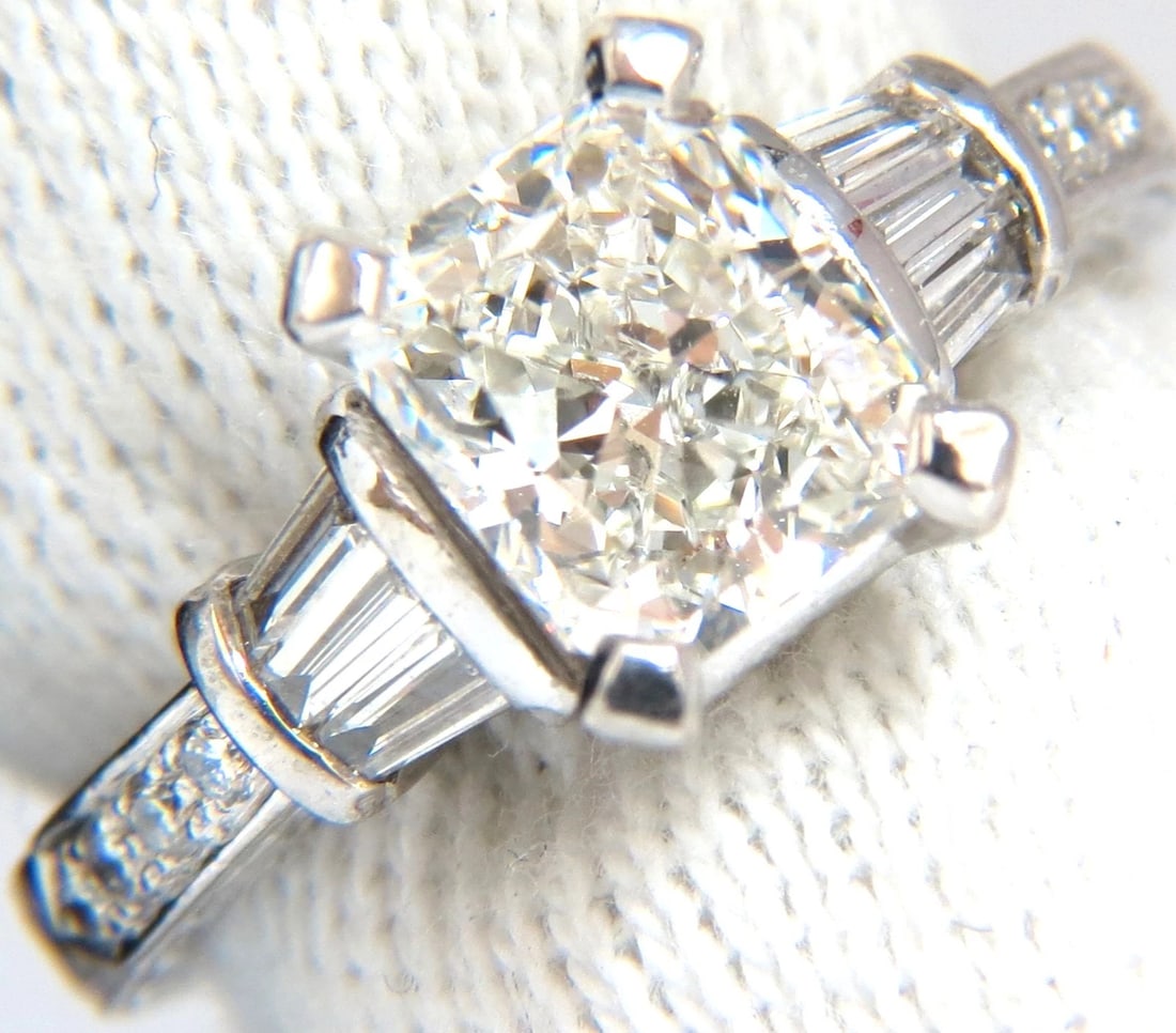 GIA certified 2.00ct. Cushion cut diamond ring G/VVS-2 platinum classic +: Title: GIA certified 2.00ct. Cushion cut diamond ring G/VVS-2 platinum classic + Description: GIA 1.50ct. Cushion cut diamond & .50ct. diamonds ring. Report: 16317918 G-color, VVs-2 Clarity (GIA Repor