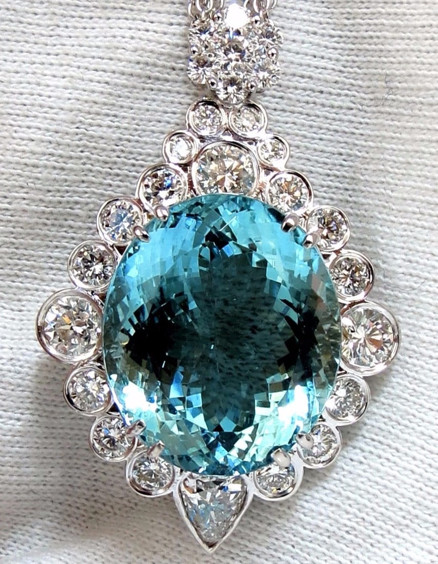 GIA Certified 33.71ct. Natural "Blue" Aquamarine Diamonds necklace **: Title: GIA Certified 33.71ct. Natural "Blue" Aquamarine Diamonds necklace ** Description: MAGNIFICENT JEWELS Investor Beauty by Diamond. GIA 29.24 "Blue" Aquamarine & Diamonds necklace. Oval and Full