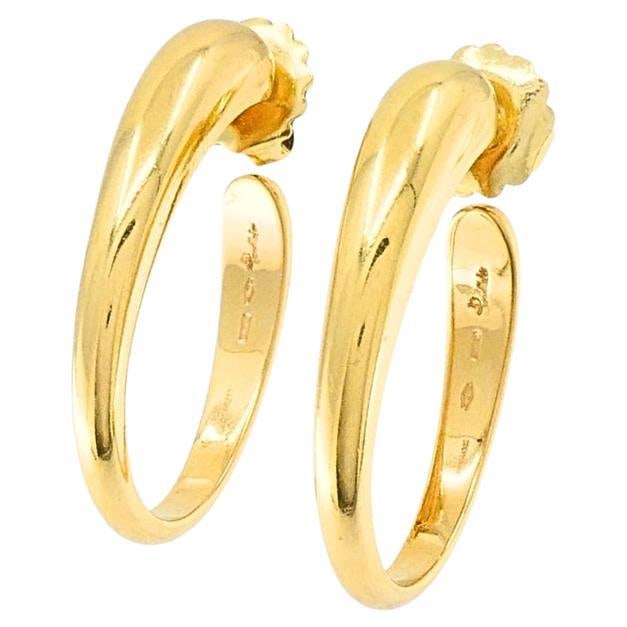 Pomellato 18k Yellow Gold Sculptural Hoop Earrings: Title: Pomellato 18k Yellow Gold Sculptural Hoop Earrings Description: DESIGNER: Pomellato CIRCA: Late 20th Century MATERIALS: 18K Yellow Gold WEIGHT: 18.5 Grams MEASUREMENT: 1 1/4" x 7/8" HALLMARKS: