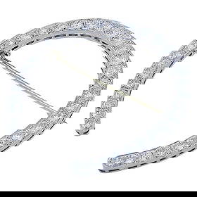 Edwardian Platinum Diamond Horseshoe Brooch: Title: Edwardian Platinum Diamond Horseshoe Brooch Description: CIRCA: 1910s MATERIALS: Platinum GEMSTONE: Diamonds WEIGHT: 10.7 Grams MEASUREMENTS: 3/16” x 1 5/8” This Edwardian platinum