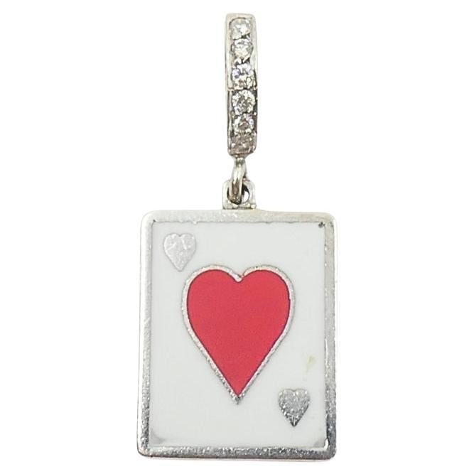 Vintage 12k Gold Playing Card Heart Charm Pavé Diamond Bail: Title: Vintage 12k Gold Playing Card Heart Charm Pavé Diamond Bail Description: This vintage charm is crafted in 12k gold and features a playing card design, showcasing the heart suit motif in re