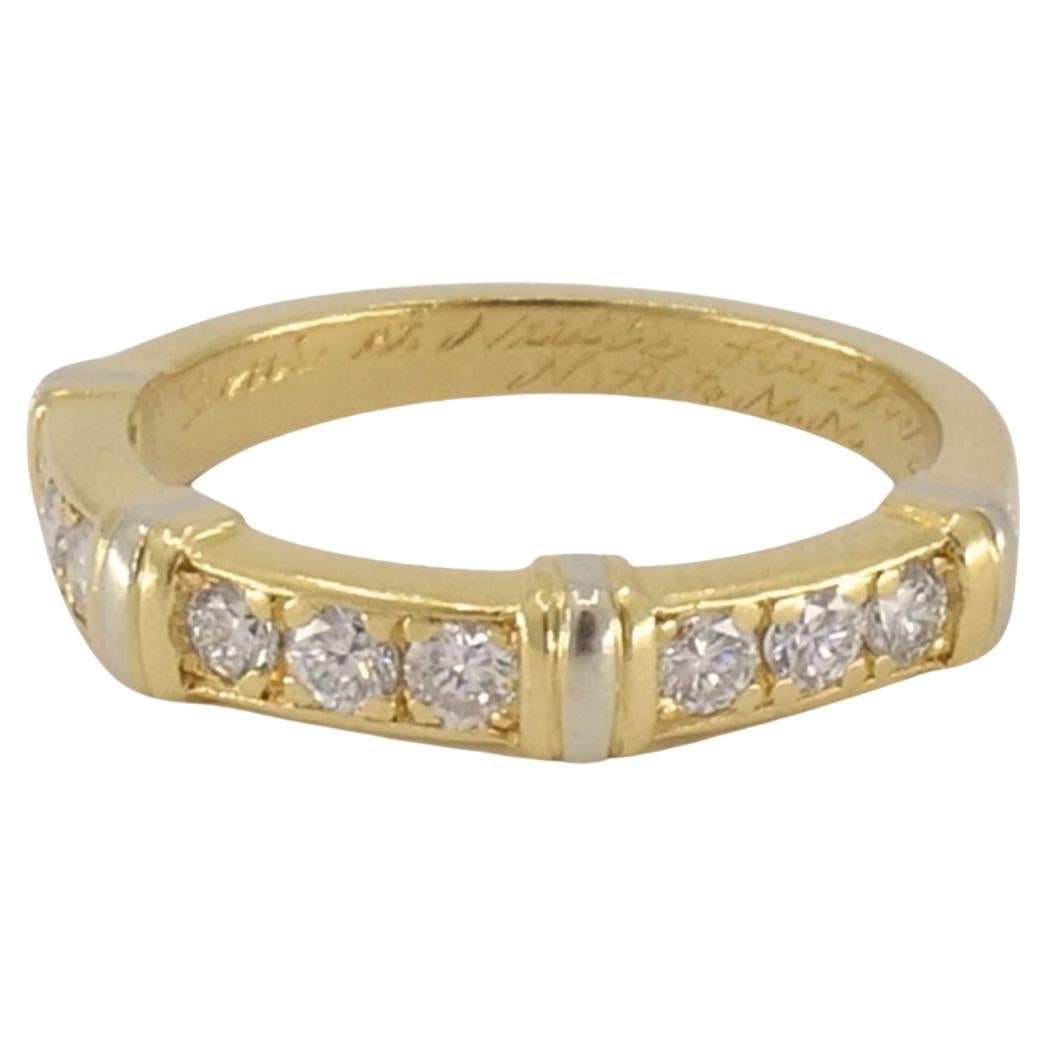 Vintage Cartier Diamond Ring 18k Yellow and White Gold: Title: Vintage Cartier Diamond Ring 18k Yellow and White Gold Description: This vintage Cartier diamond ring is made in 18k yellow gold with white gold details. The band is designed with a geometric l