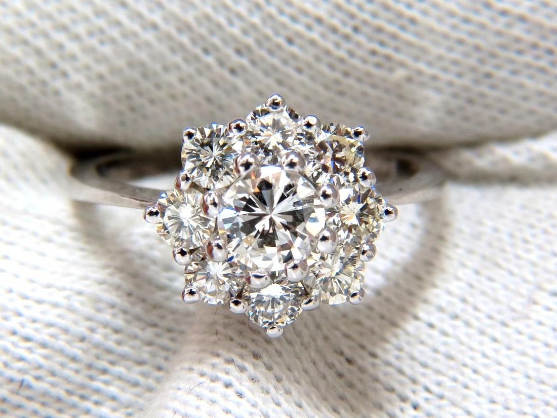 1.40ct diamonds raised cluster ring 14kt + - 9