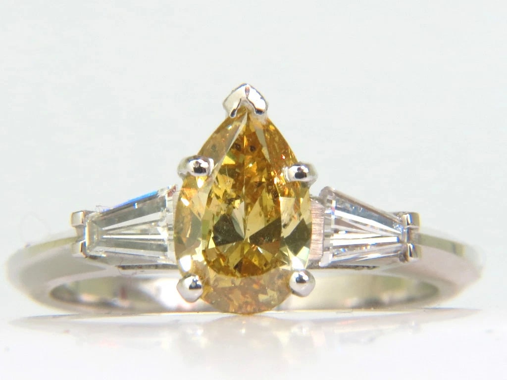 GIA 1.62CT NATURAL FANCY YELLOW DIAMOND RING+: Title: GIA 1.62CT NATURAL FANCY YELLOW DIAMOND RING+ Description: ONLY MAGNIFICENT JEWELS 1.12ct. Natural Fancy yellow diamond GIA Certified stating: Brown / Orange / Yellow color. Brilliant pear