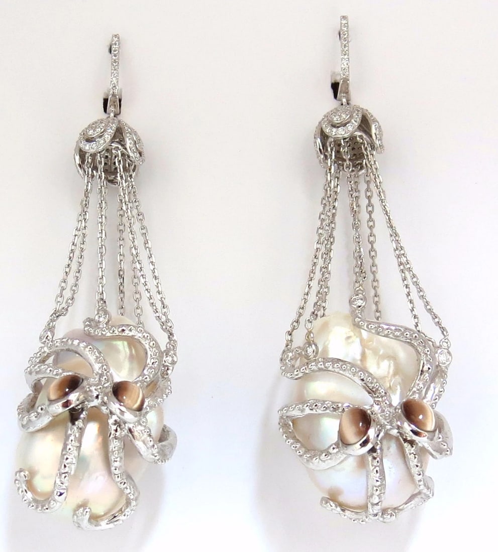 GIA Certified 30mm Baroque Pearls Catseye Ocotopus diamond dangle earrings**: Title: GIA Certified 30mm Baroque Pearls Catseye Ocotopus diamond dangle earrings** Description: Octopus catch / dangle earrings. 30mm & 29mm natural Freshwater Baroque pearls. GIA Certified White wit