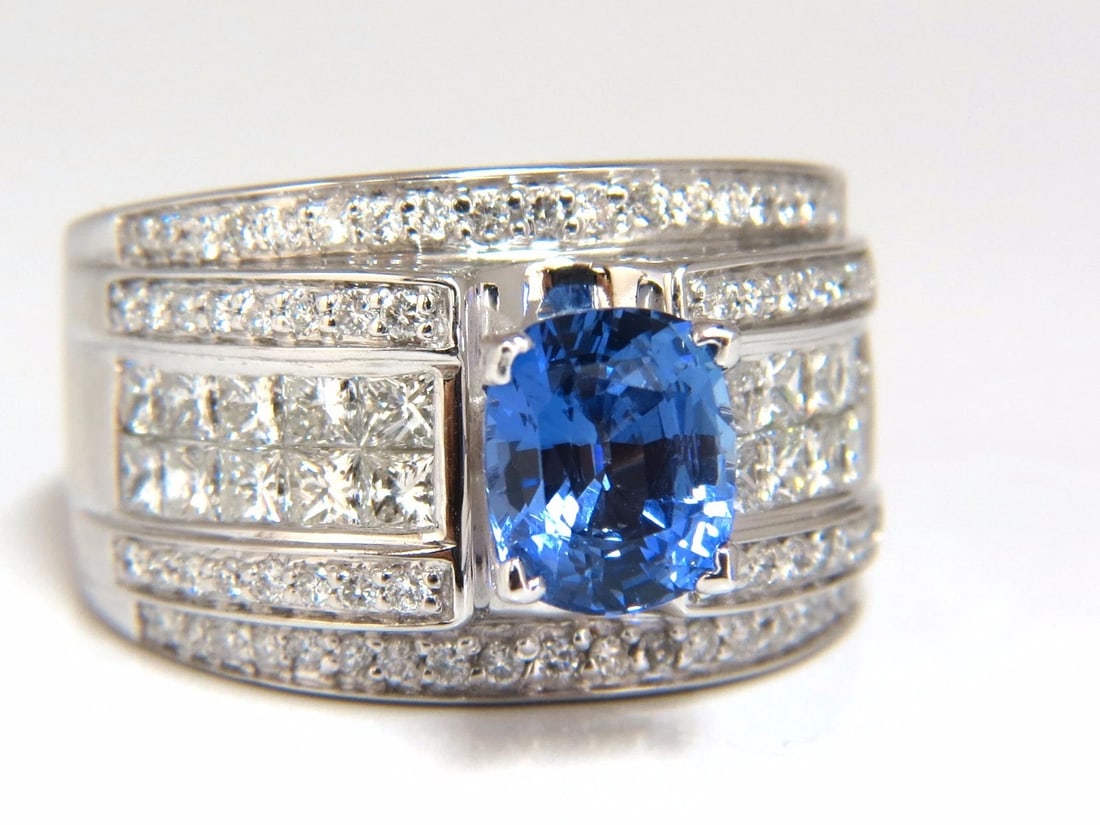 GIA Certified 3.75ct Natural Blue Sapphire Diamonds Ring Multi Row+: Title: GIA Certified 3.75ct Natural Blue Sapphire Diamonds Ring Multi Row+ Description: Multi Row Diamond Accent Wide GIA Certified 2.25ct. Natural No Heat Blue Sapphire ring. Report: 2185115086 Cushi