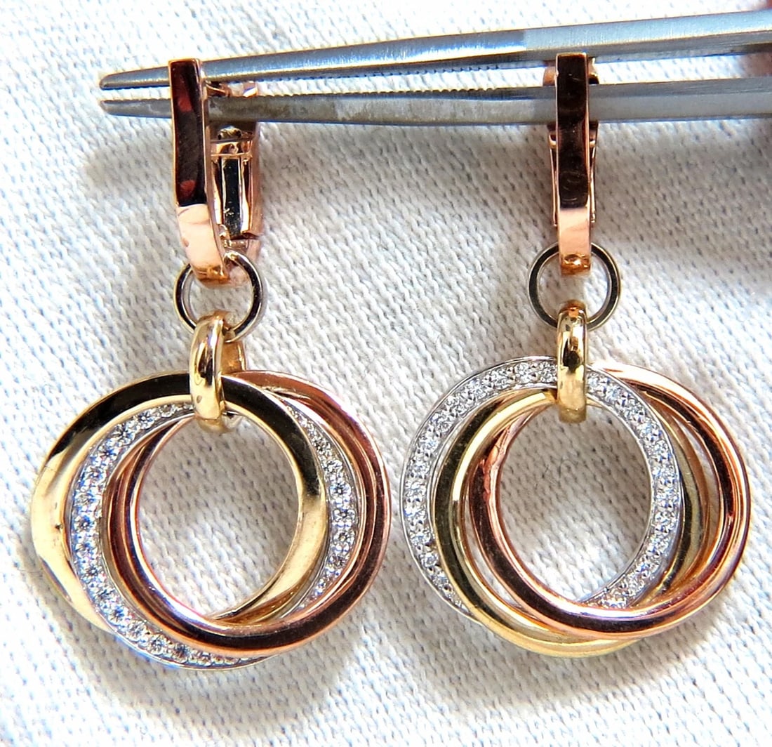 .50ct natural diamonds rolling loop rings dangle earrings 14kt multi+: Title: .50ct natural diamonds rolling loop rings dangle earrings 14kt multi+ Description: Rolling Rings circle loop earrings. The Modern Dangle. .50cts of natural round diamonds: G-color, Vs-2 clarity