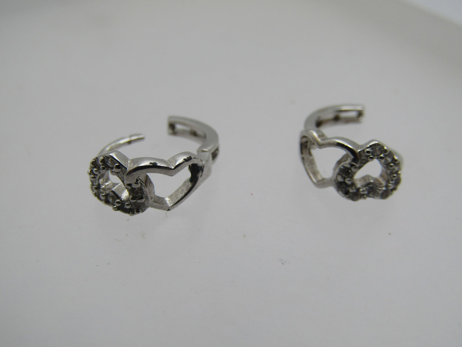Vintage Sterling Double Heart Rhinestone Hoop Earrings, Petite Hoop, Signed JTS: Vintage Sterling Double Heart Rhinestone Hoop Earrings, Petite Hoop, Signed JTS, Appx. 1980's-1990's , 1/2" Long with a locking hook post. To open hearts - one is plain and one has clear rhinestones