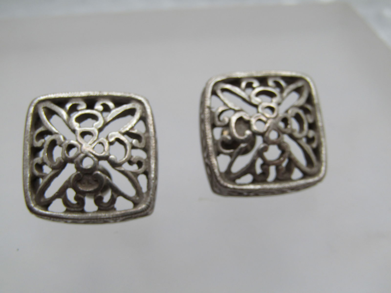 Vintage Scrolled Square Earrings, Signed Ann Klein, 1980's-1990's: Vintage Scrolled Square Earrings, Signed Ann Klein, 1980's-1990's. Slightly domed and appx. 3/4" square with open-work scrolled blossom design. Signed AK. Silver tone with gold filled posts. Very good